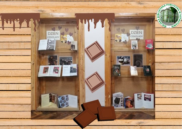 zdjęcie wystawy książek o czekoladzie z grafikami kostek czekolady i logo biblioteki